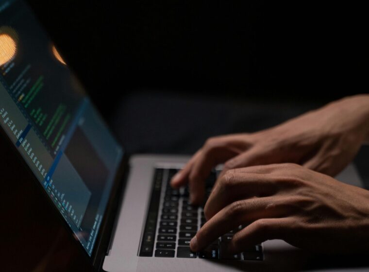 person-using-silver-and-black-laptop-computer