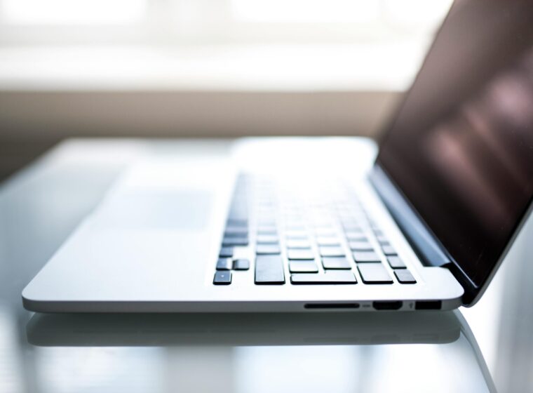 shallow-focus-photography-of-macbook