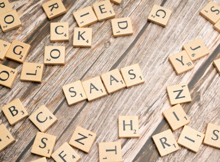 scrabble-letters-spelling-saas-on-a-wooden-tabl